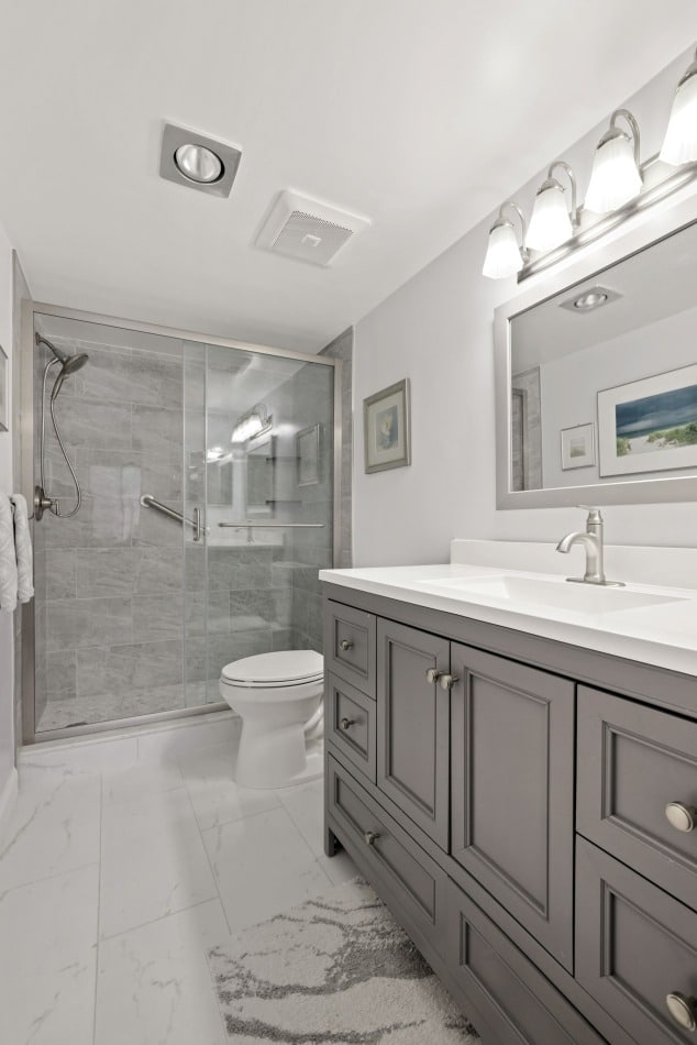 Gray and White Bathroom Remodel With Vanity