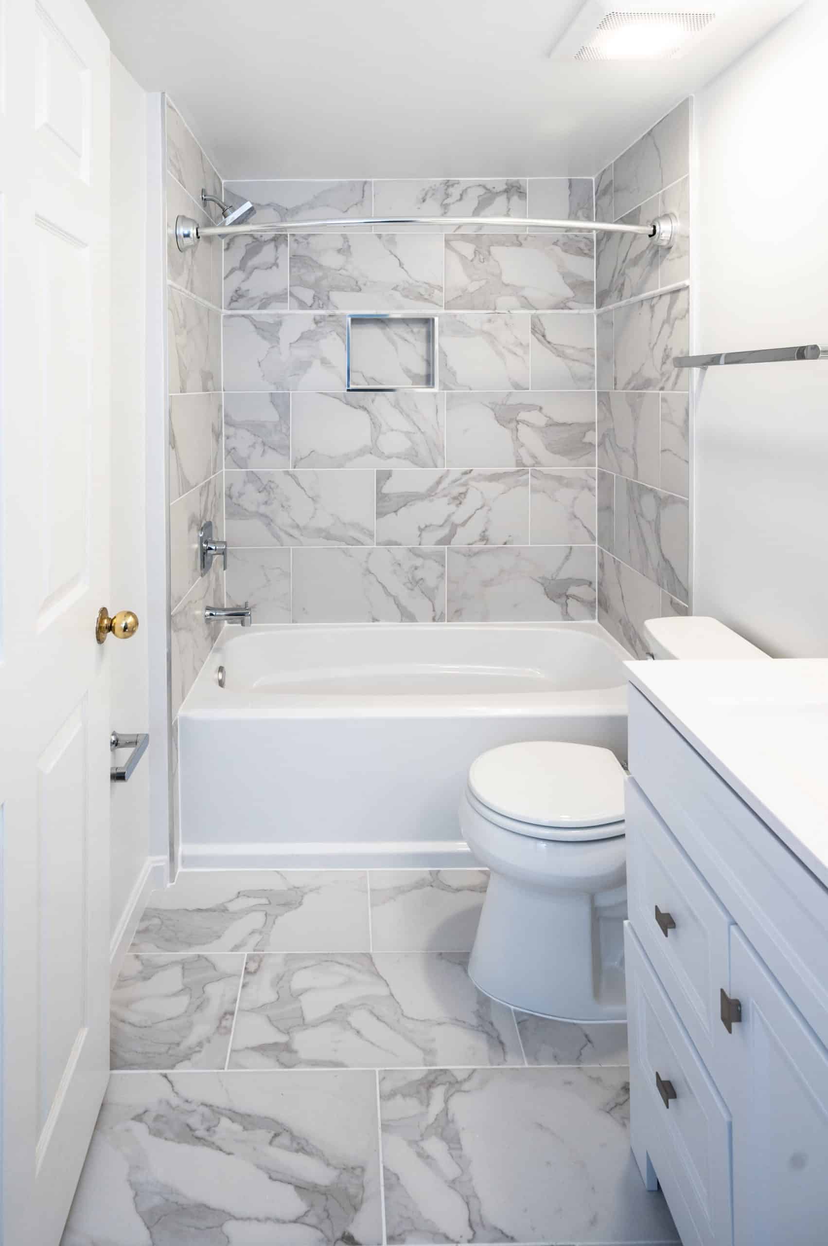 Gray Mixed Tile Bathroom Remodel