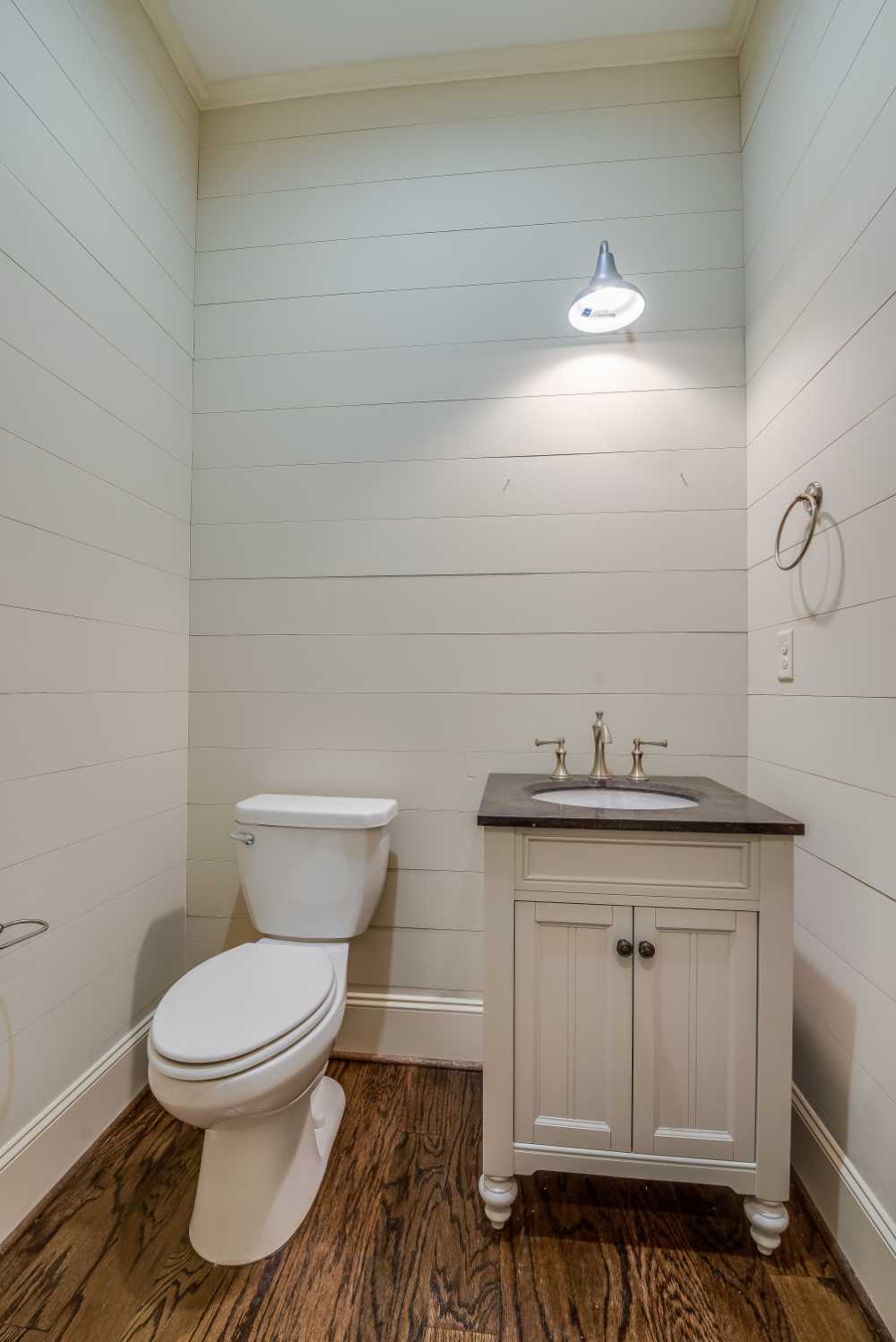 A small half bathroom with quick private access converted from a small closet