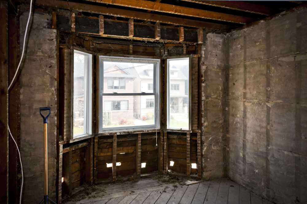 an interior room currently under a gut renovation and remodel process